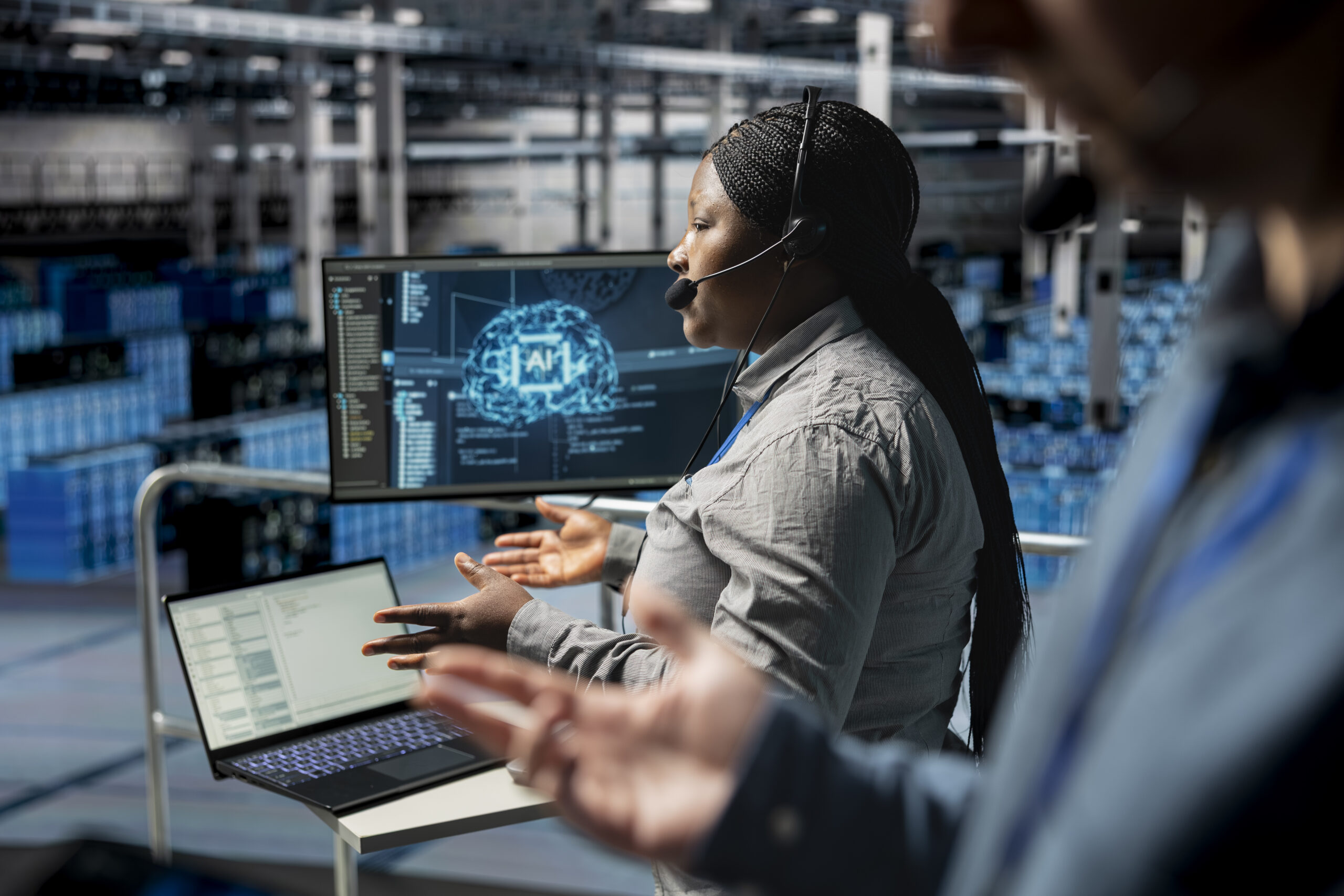 Data center tech support admin using headset mic interpreting AI ...